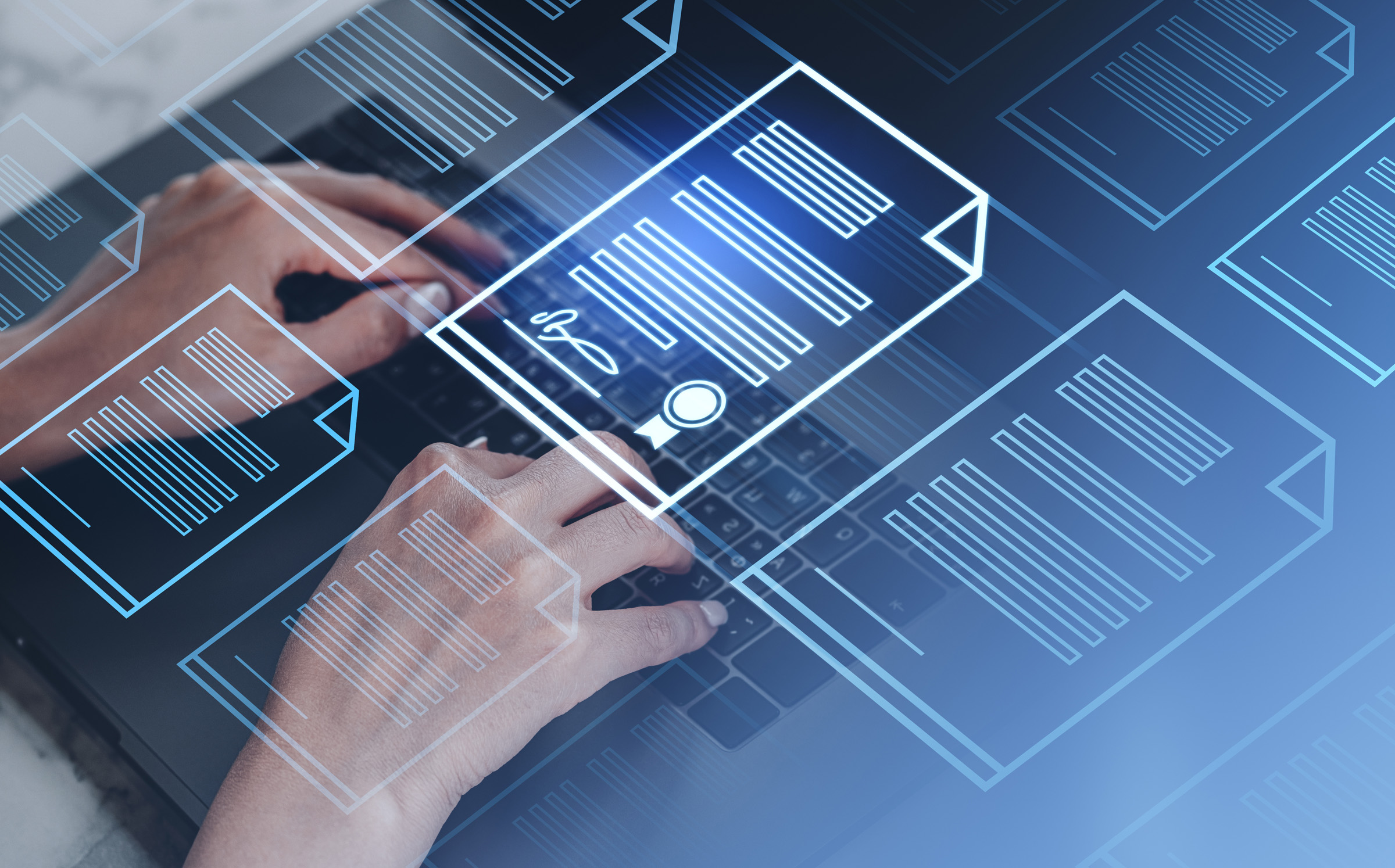 Hands typing on a laptop with glowing blue digital document icons and barcode graphics overlaid, representing digital docu...