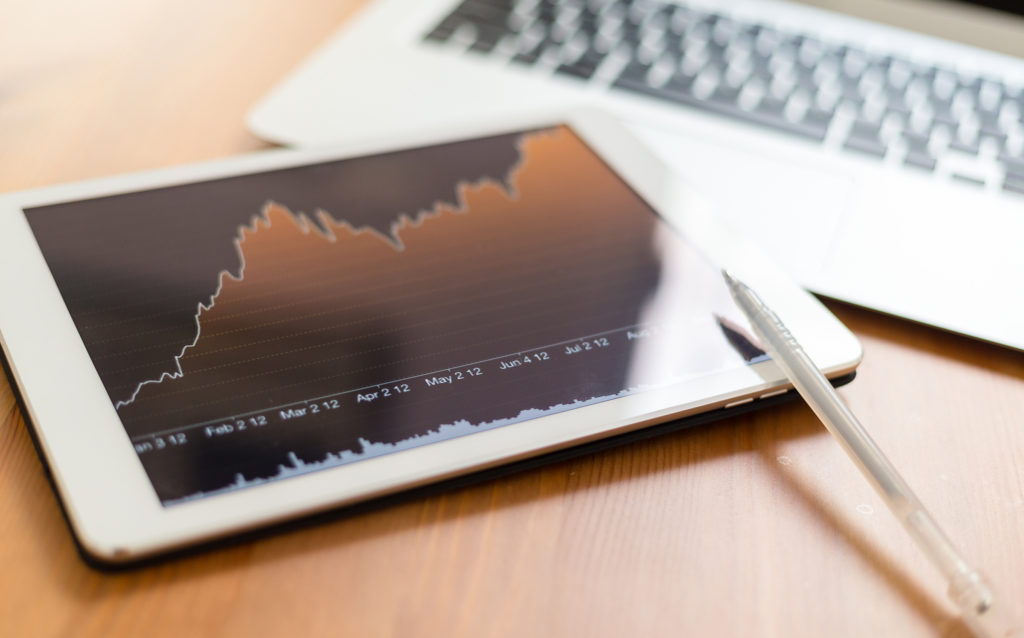 Higher Education Institutions Finance 1 page financial charts on tablet