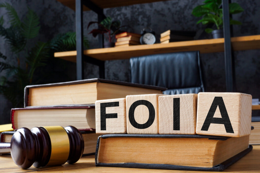 FOIA Freedom of information act concept. Cubes on the office table.